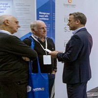 Balmain Senior Account Executive, Jonathan White chats with Visitors to the Balmain Private Stand